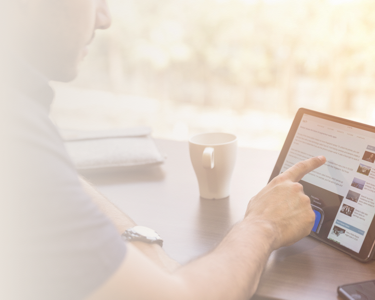 Image illustrating tablet use for business in the legal and mesothelioma news sectors.