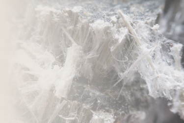 Detailed view of a asbestos fibers, relevant to understanding mesothelioma.